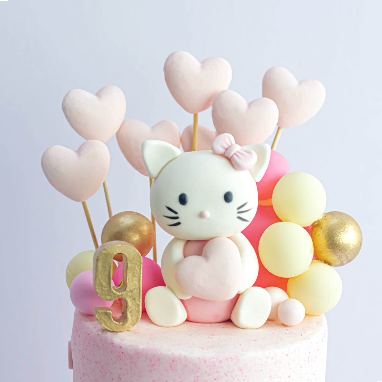 Two-Tier Hello Kitty Theme Cake