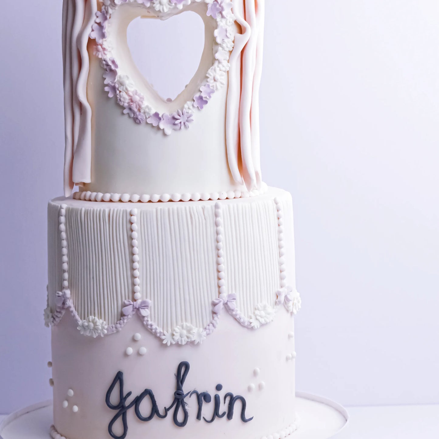 Two-Tier Bow and Heart Cake