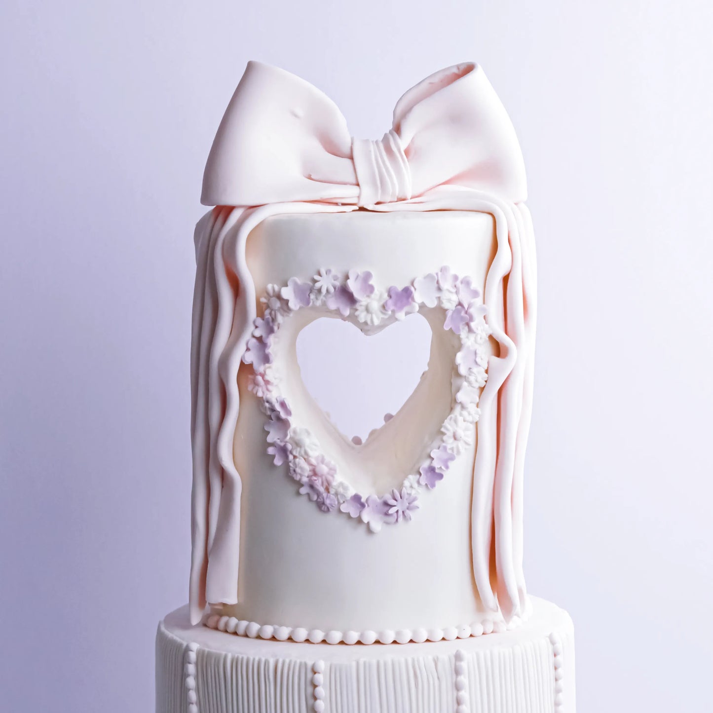 Two-Tier Bow and Heart Cake