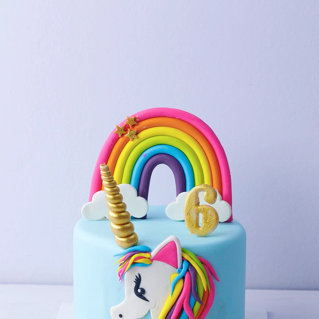 Whimsical Rainbow Unicorn Cake