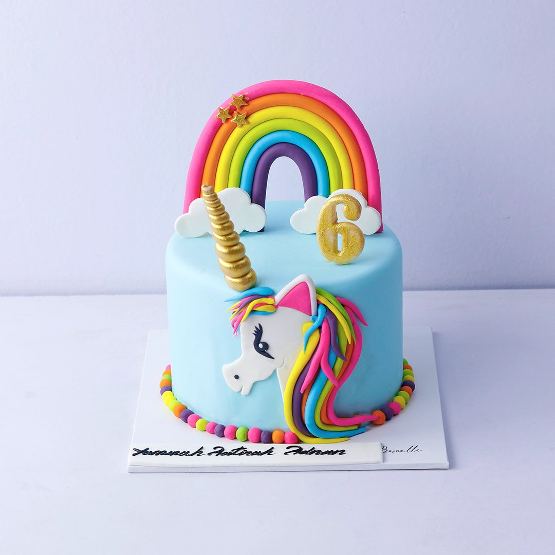 Whimsical Rainbow Unicorn Cake